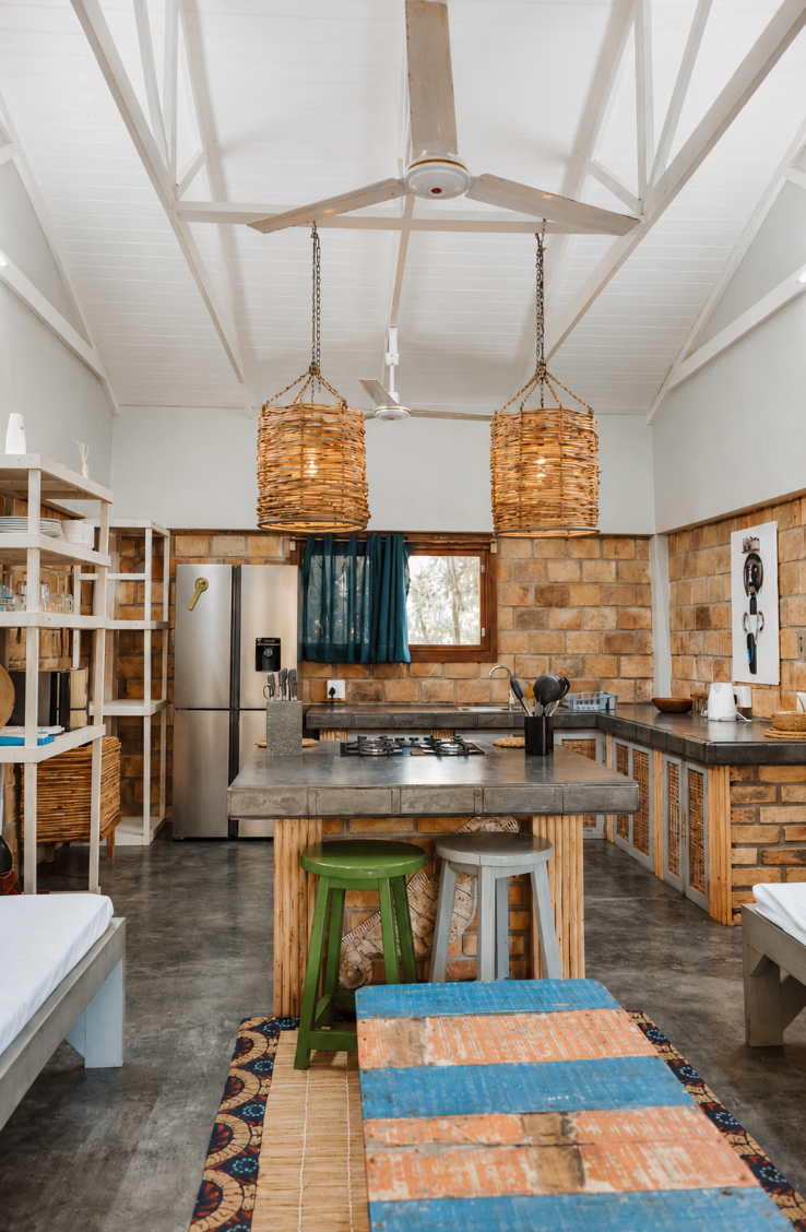 Two Bedroom House open-plan kitchen with woven pendant lights