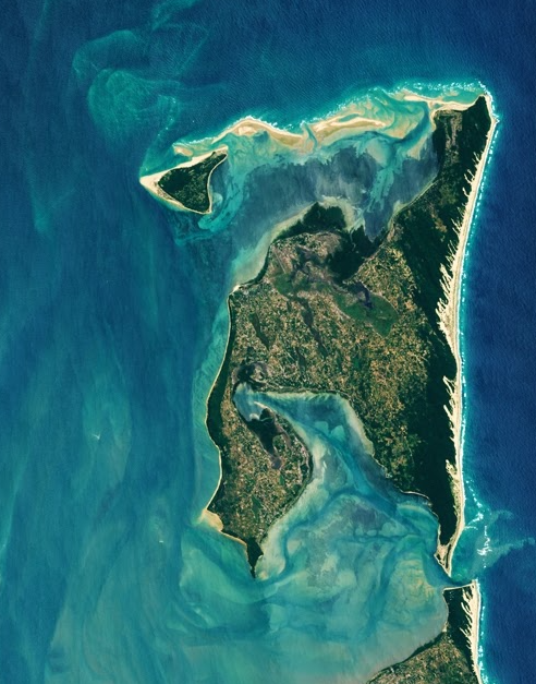 Aerial view of turquoise water and sandbanks surrounding Inhaca Island